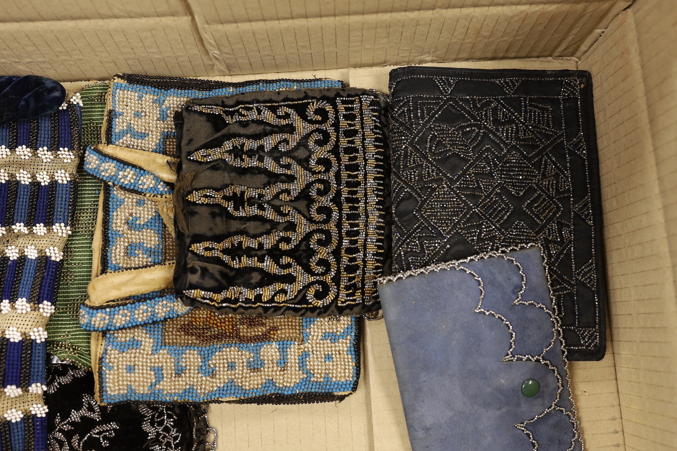 A collection nine 19th and 20th century beaded and petite point bags